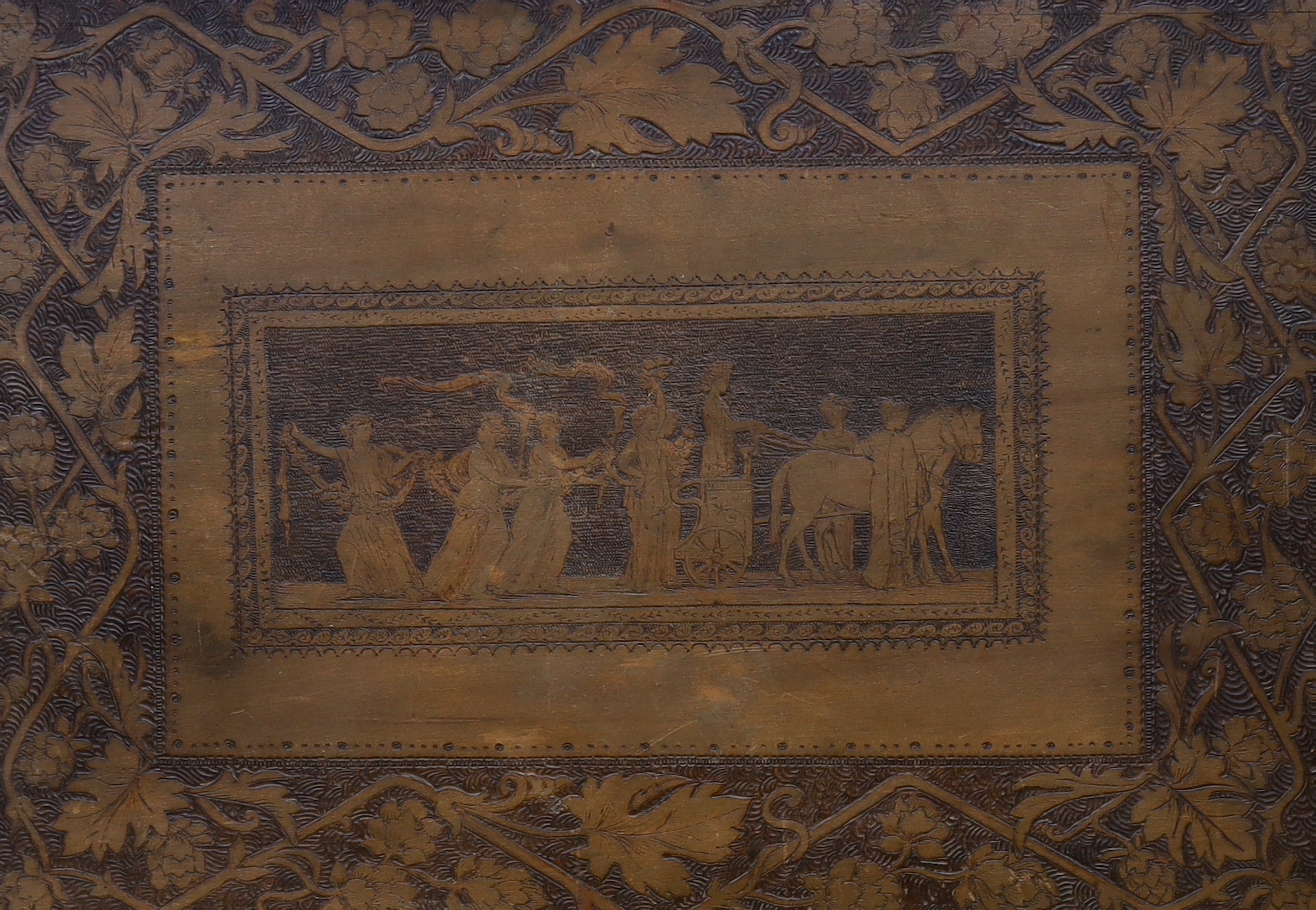 A 19th century Pyrography panel, depicting a classical procession of figures and floral border, 34 x 50cm, gilt framed